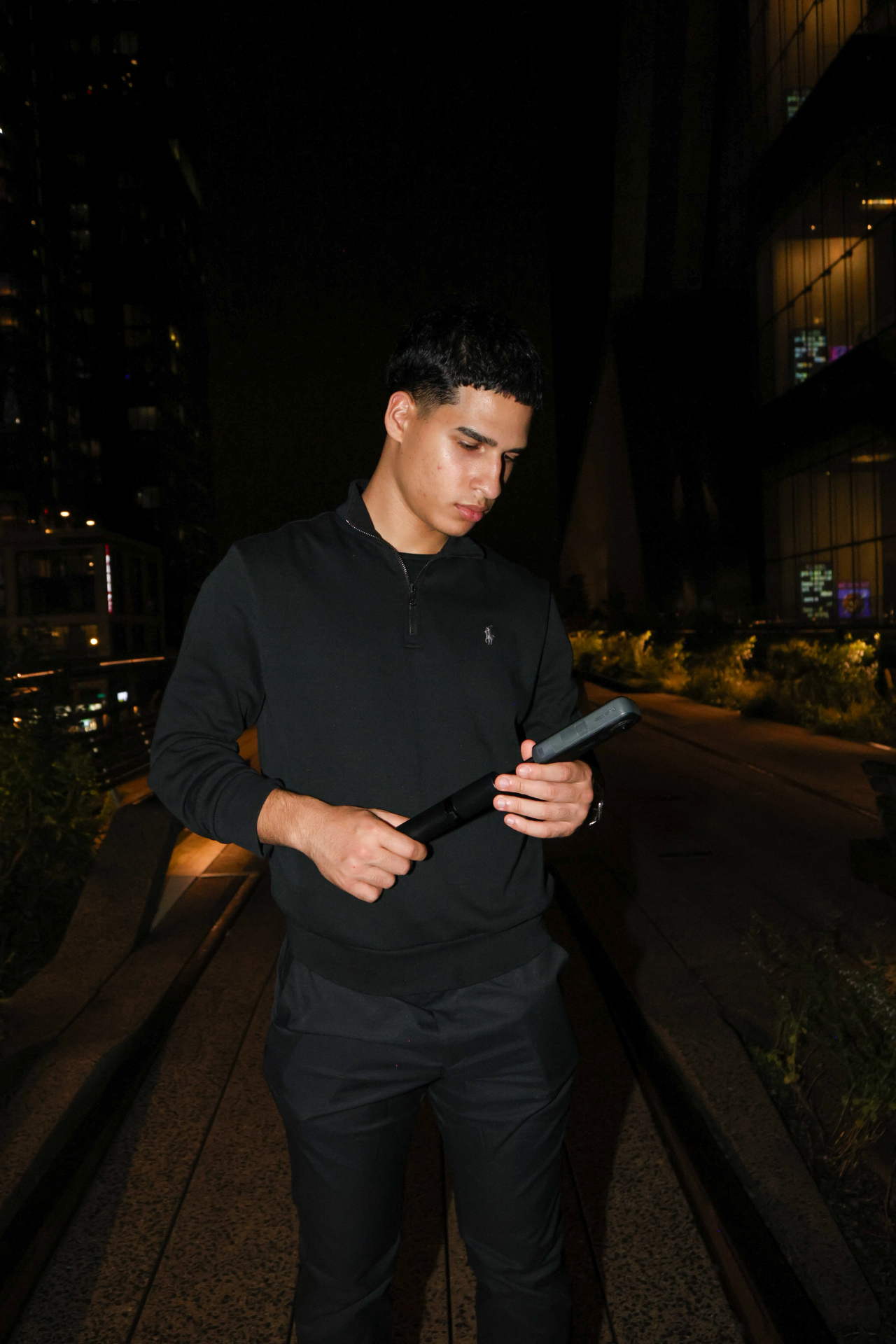 Irving Aguilera, founder of A1Media, on location at night — preview photo